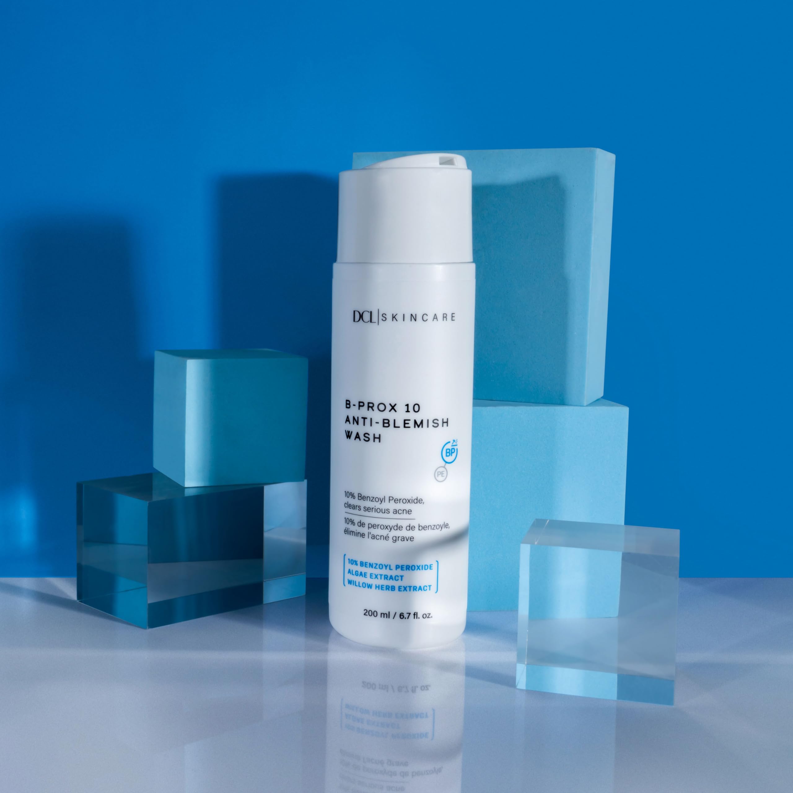 DCL B Prox logo close-up on cleanser packaging.