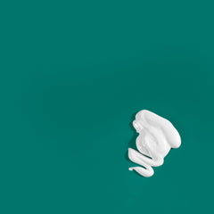 DCL Zoma in a bathroom scene suggesting daily dandruff care with gentle cleansing.