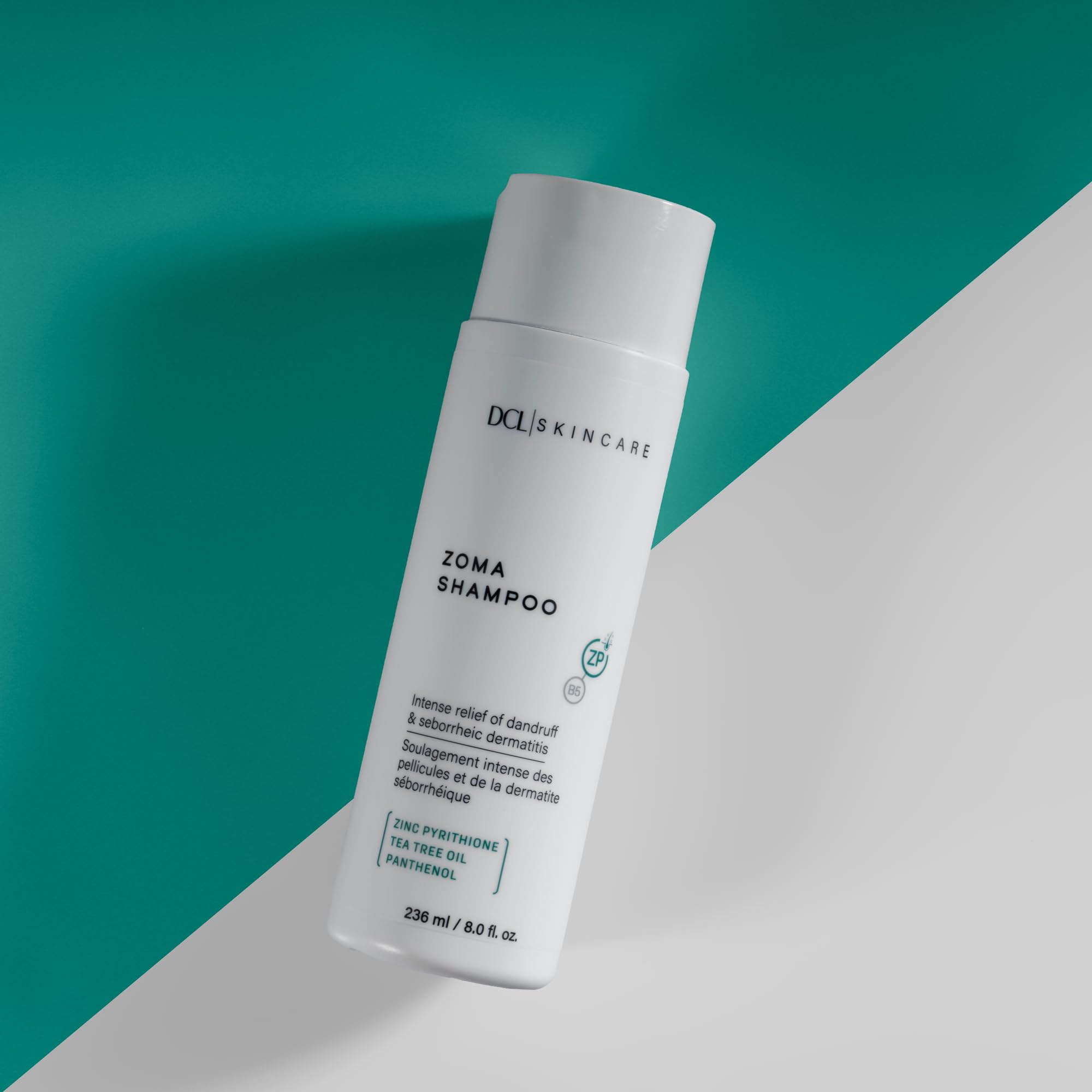 DCL Zoma ingredients swatch graphic emphasizing zinc pyrithione-based dandruff control.