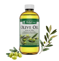 De La Cruz Pure Olive Oil bottle shown for moisturizing hair and skin benefits.