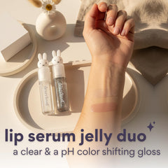 Dearcloud Miffy color change gloss applying on skin demonstrates pH adapting shade.