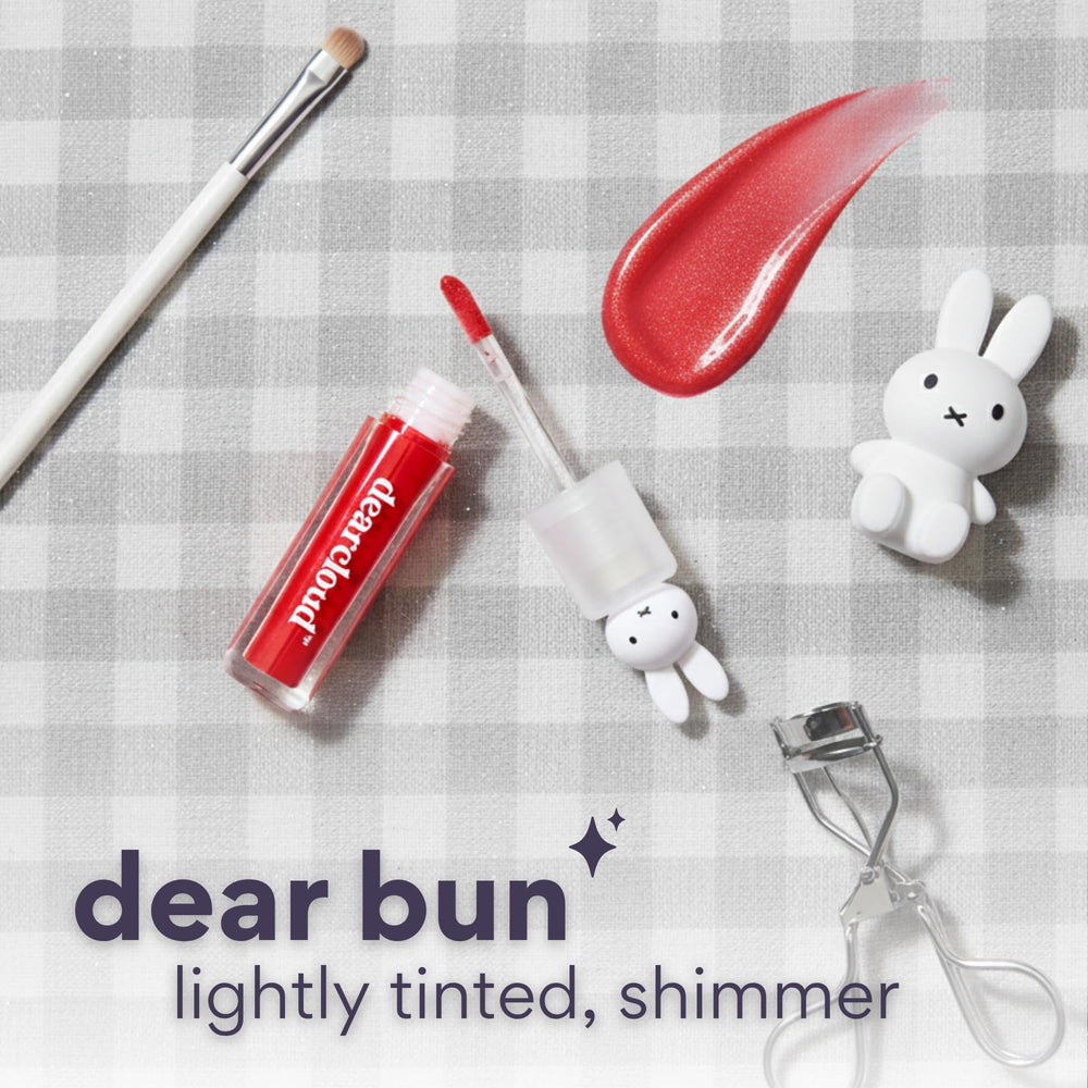 Dearcloud Miffy Lip Serum Jelly high-shine gloss on lips.