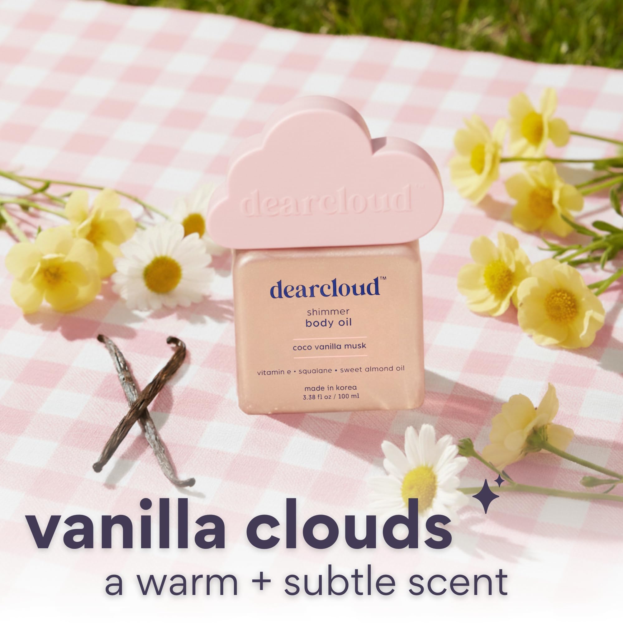 Dearcloud Shimmer Body Oil glow highlights radiant skin with a natural finish.
