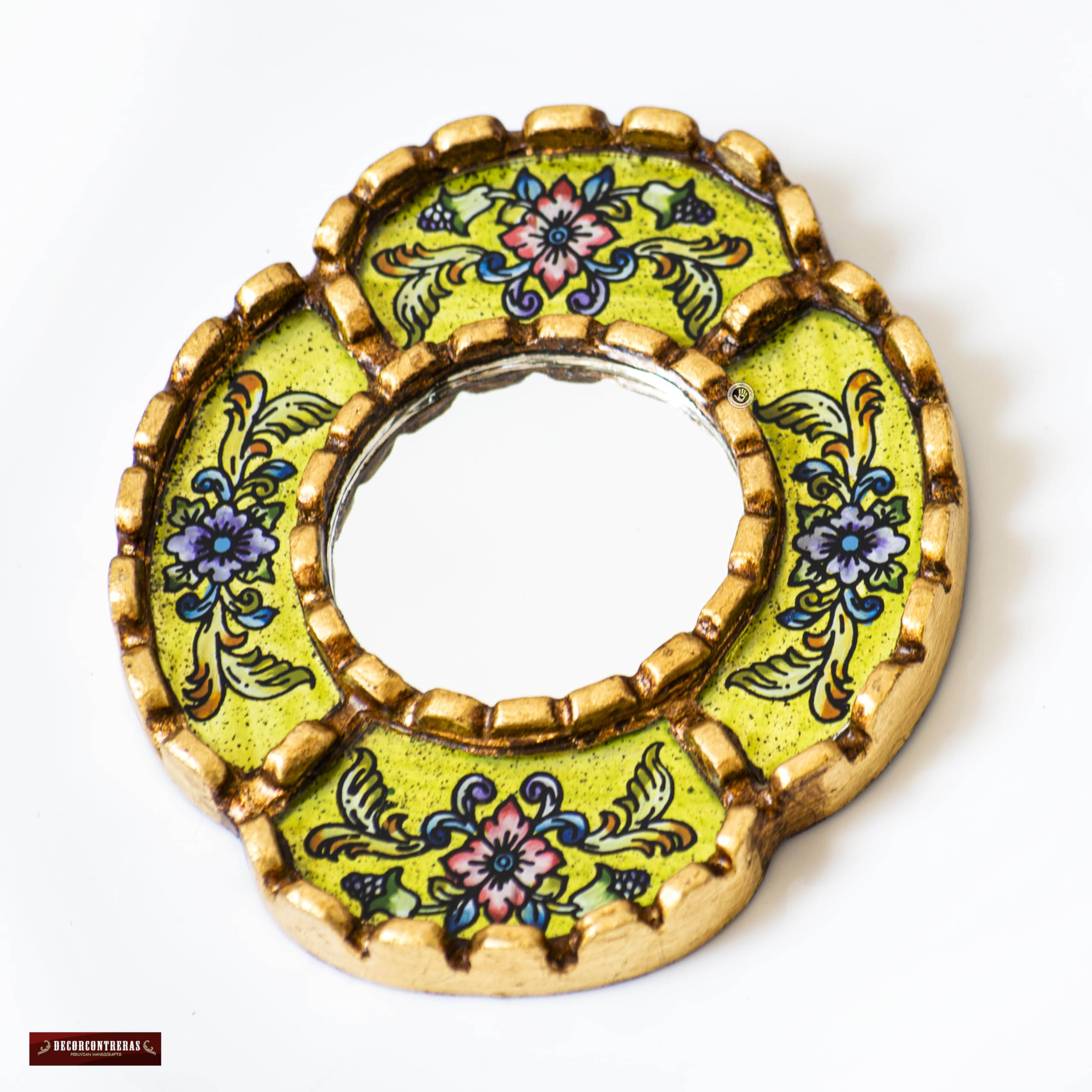 DecorContreras small oval mirror ready-to-hang in entryway or hallway.