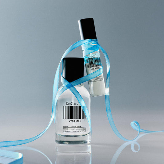 DedCool Xtra Milk bottle tilted to showcase modern, genderless design.