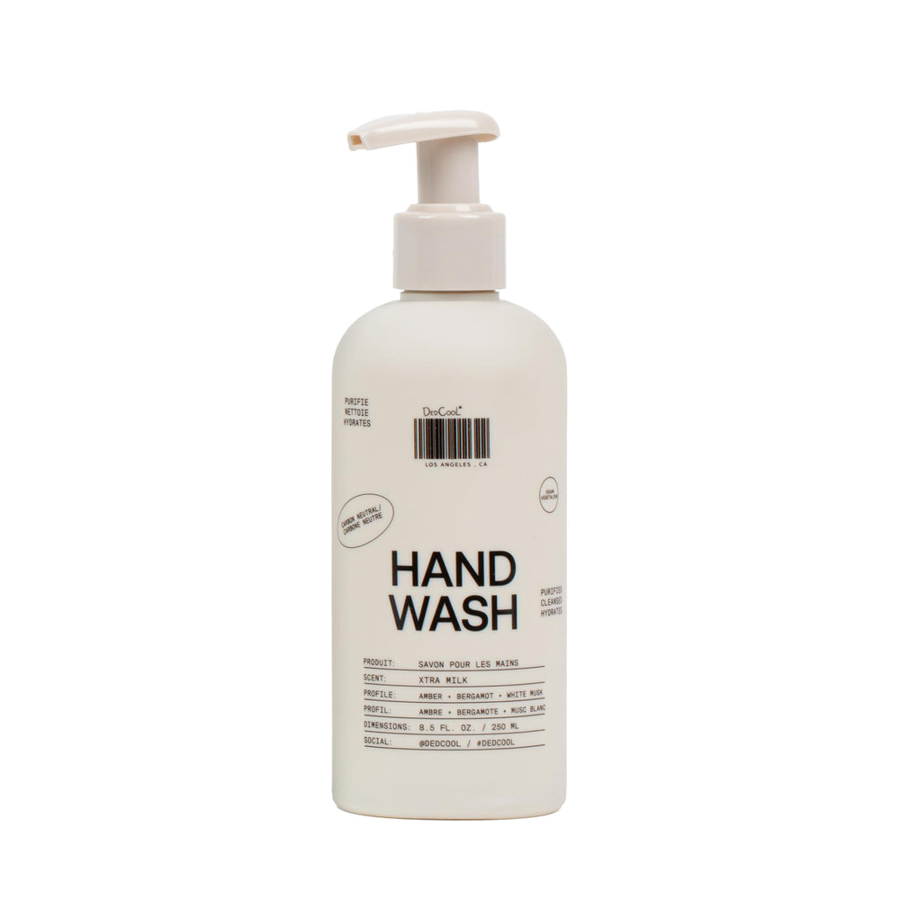 DedCool Xtra Milk Hand Wash bottle on a counter, showing a hydrating formula for daily care.