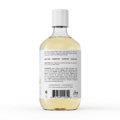 Deep Steep Bubble Bath Cypress Fennel being poured to create a relaxing aromatherapy moment