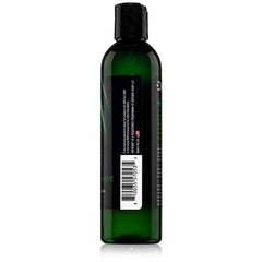 Defense Soap Peppermint Tea Tree Body Wash in bathroom shelf setup