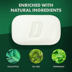 Defense Soap tea tree oil drops on the bar surface suggesting cleansing power