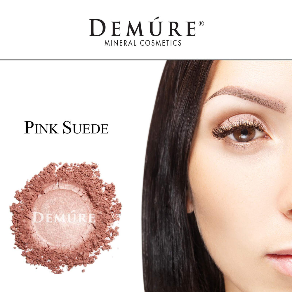 Demure Eye Shadow application brush aids smooth layering and precise color.