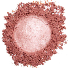 Demure hot pink eyeshadow closeup showing rich mineral pigment for day-to-night looks