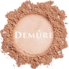 DEMURE mineral blush closeup highlights ultra-fine powder for lightweight feel.