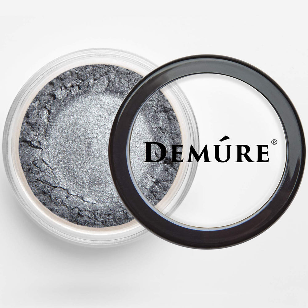 Demure Mineral Eye Shadow Sterling packaging highlights travel-friendly, fragrance-free formula.