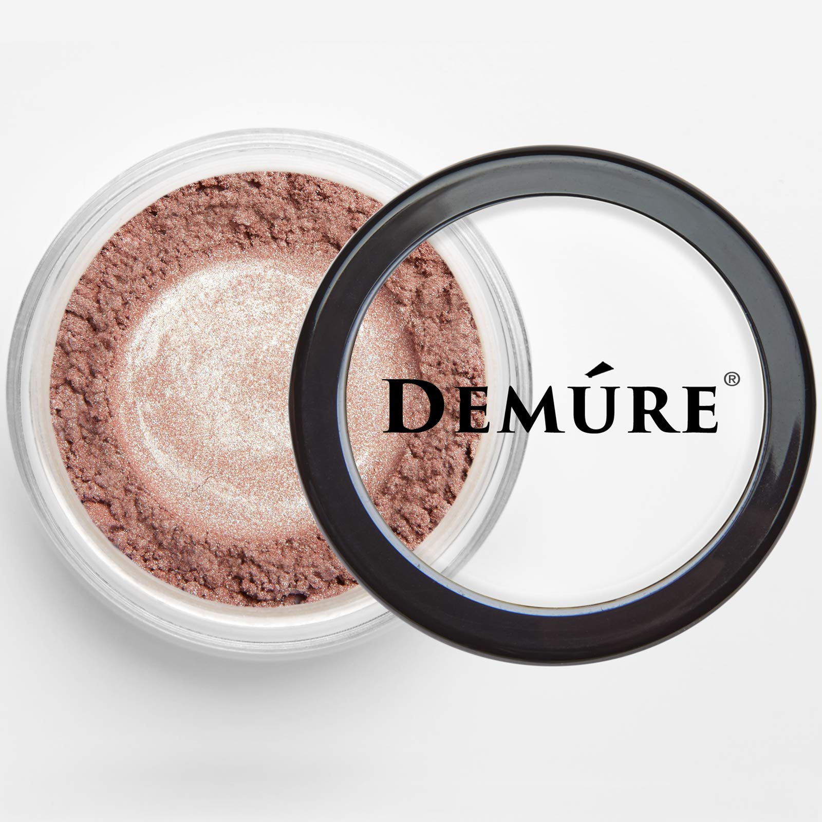 Demure mineral pigments close-up reveals natural color payoff from crushed earth minerals.