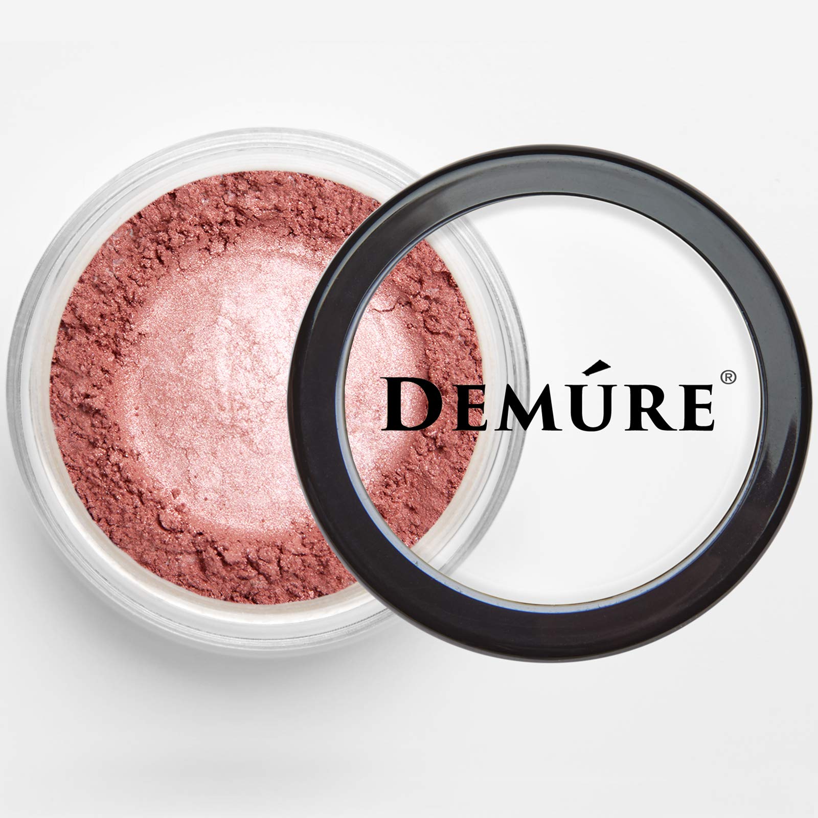 Demure shimmering eyeshadow compact with soft metallic shimmer