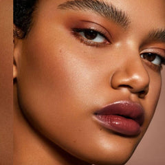 Depuplum Hydrate Lipstick with shea butter and coconut oil nourishes lips.