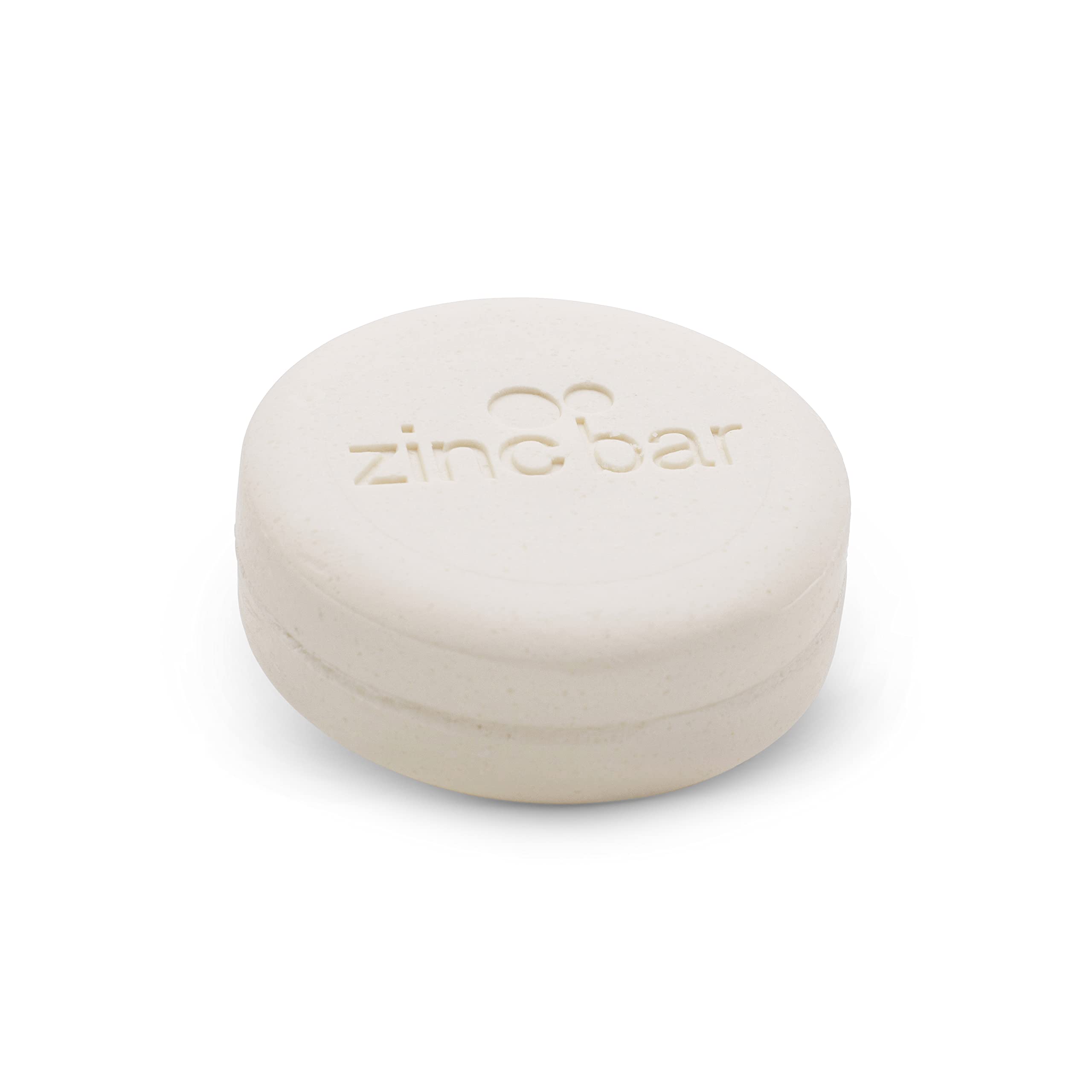 DermaHarmony pyrithione zinc bar close-up with visible lather for gentle cleansing.