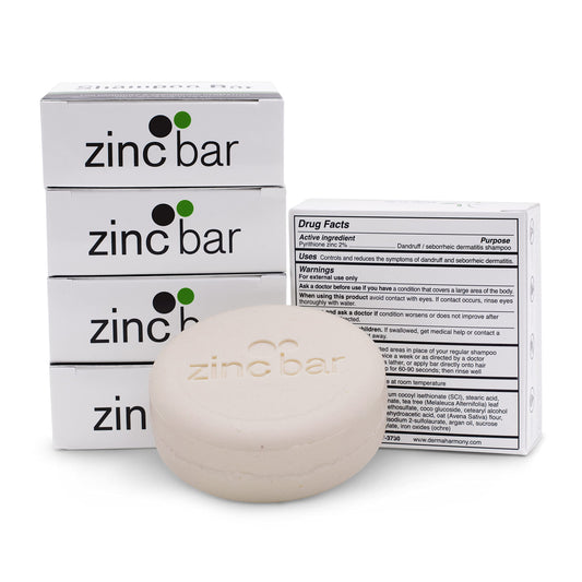 DermaHarmony shampoo bar being rubbed to lather for scalp care