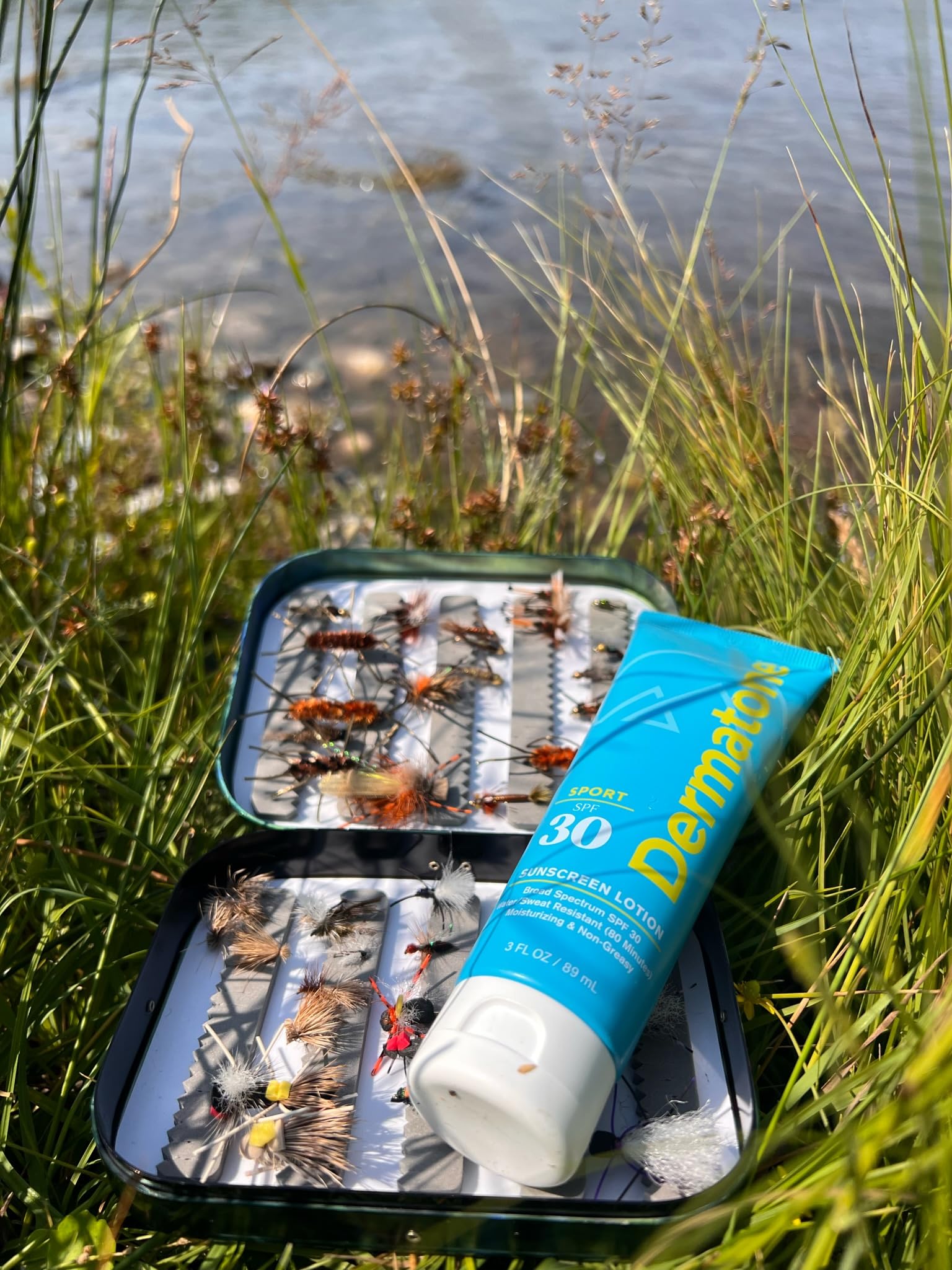 Dermatone Sport Sunscreen Lotion in a backpack for outdoor adventures