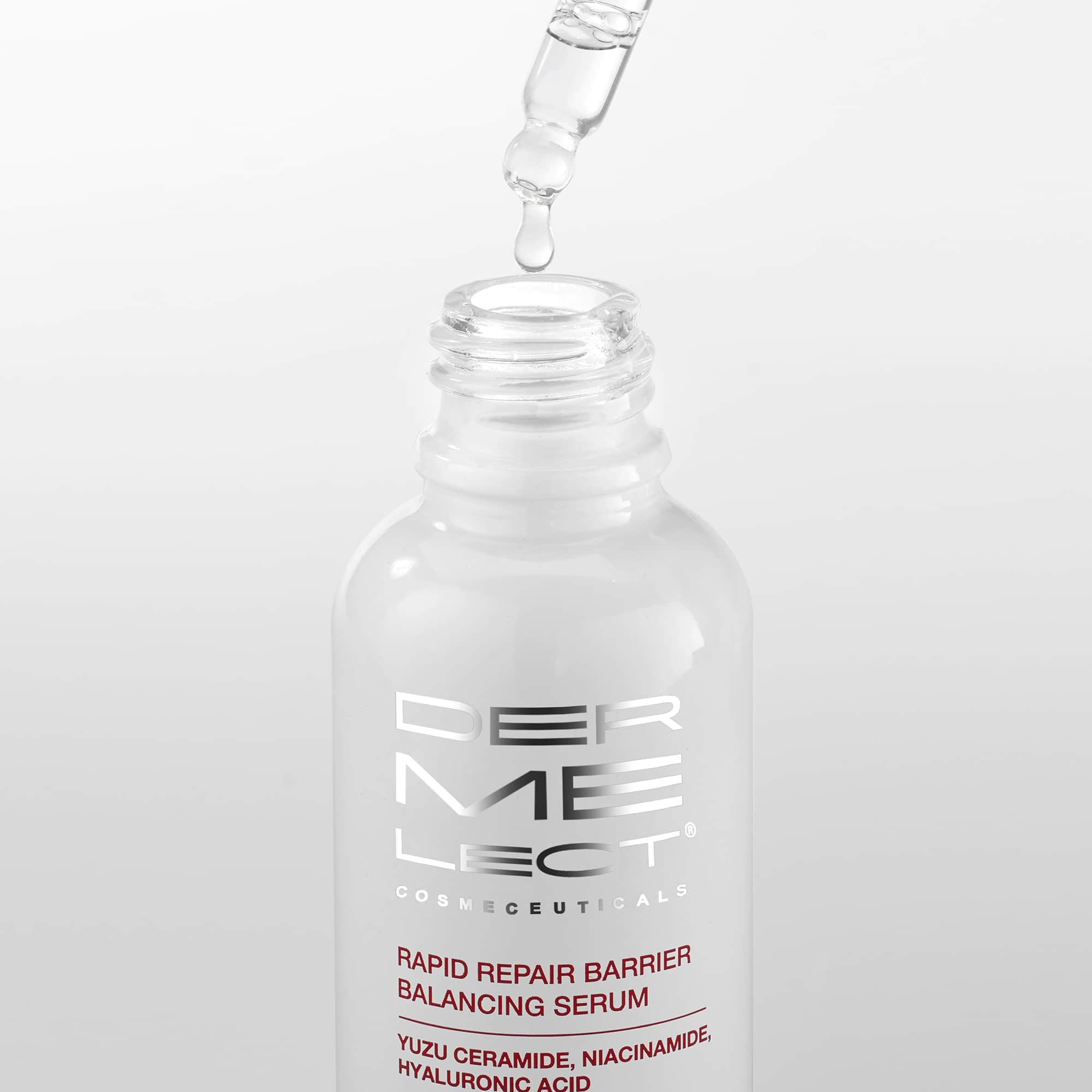 Dermelect Rapid Repair Serum label close-up showcases premium ingredients.