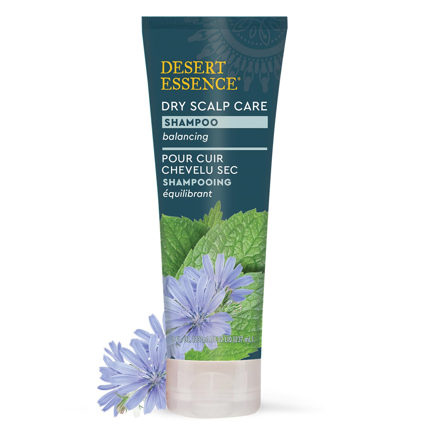 Desert Essence Dry Scalp Care Shampoo label highlights tea tree and inulin for gentle scalp care