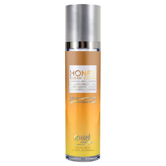 Devoted Creations Honey Gleam Cream jar close-up showing luminous mineral texture for radiant skin.