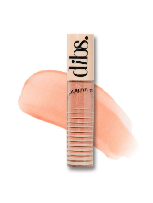 DIBS Go To Glossy Balm lip gloss topper adds high shine with pearl-like iridescence.