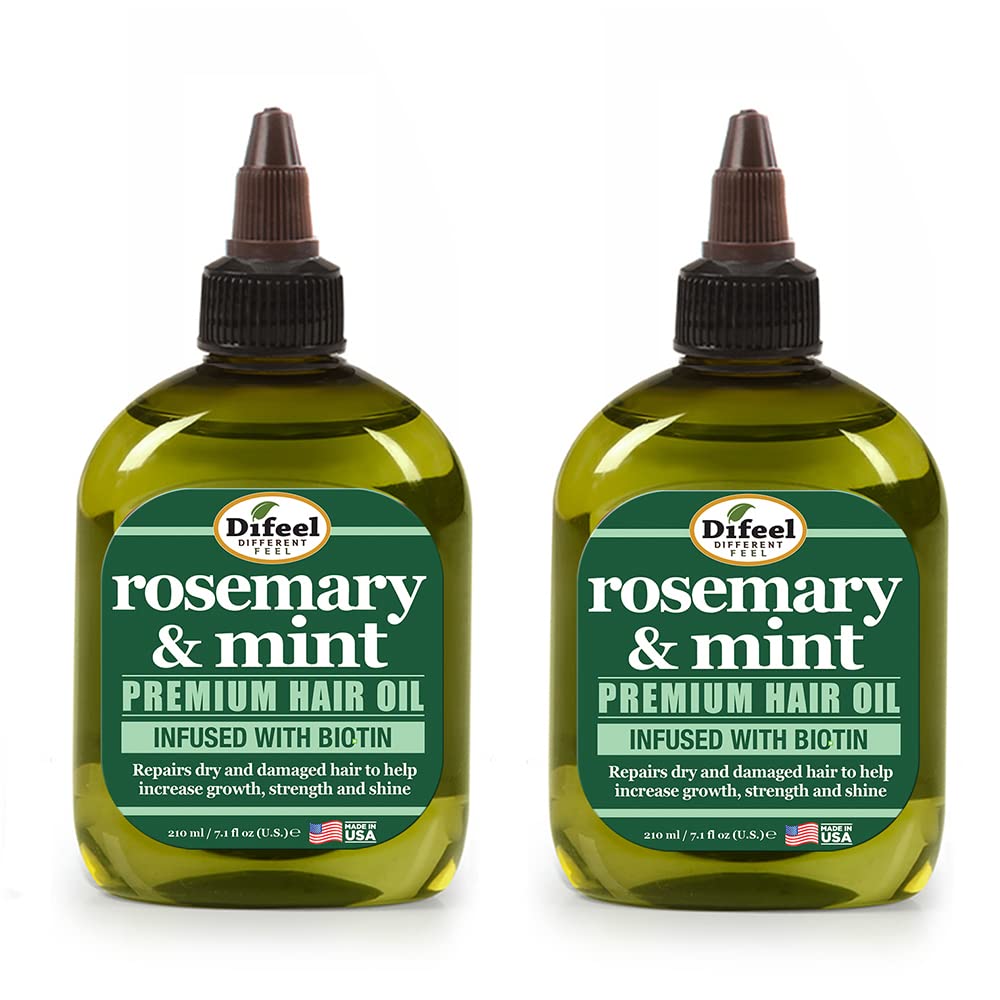 Difeel Rosemary and Mint Hair Oil bottle closeup highlighting biotin benefits