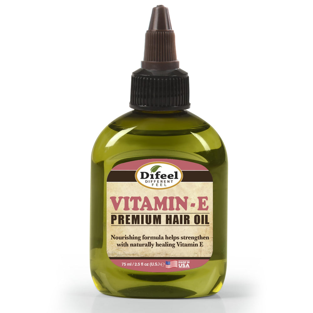 Difeel Vitamin E Premium Hair Oil bottle close-up for shine and smoothness