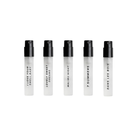 DIME Beauty perfume sampler travel case open showing vials for on the go