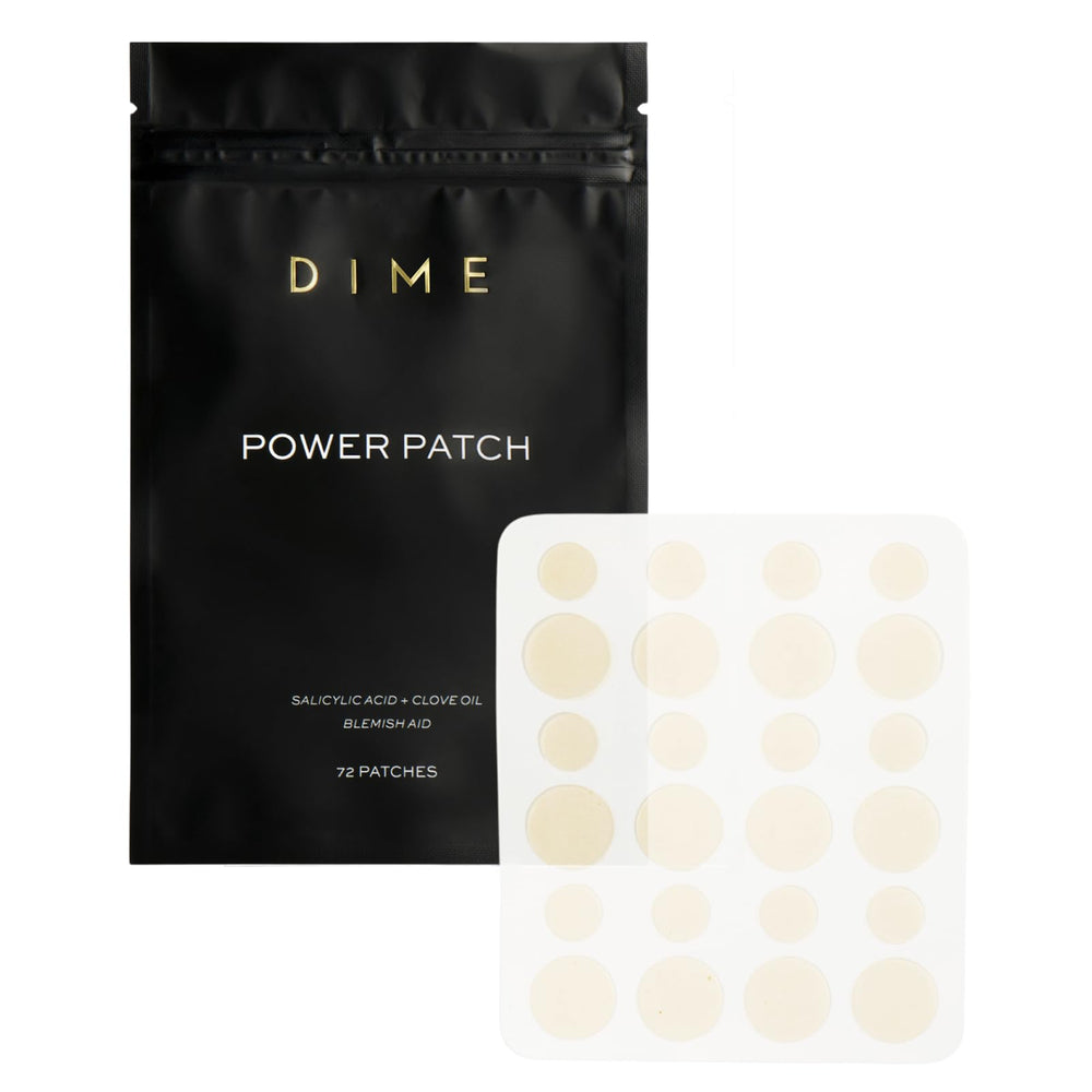 DIME Beauty Power Patch applied on the face targeting a blemish for precise spot care.