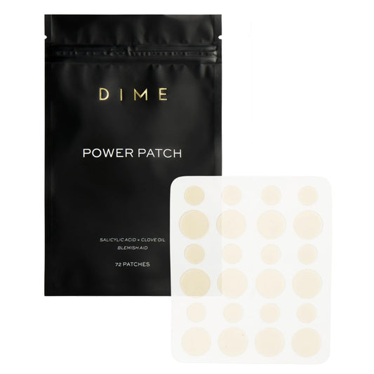 DIME Beauty Power Patch applied on the face targeting a blemish for precise spot care.