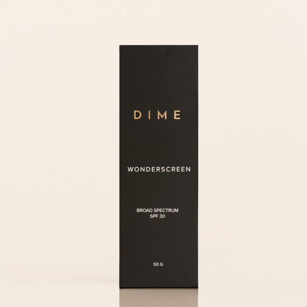 DIME Wonderscreen applied under makeup for seamless daily protection.