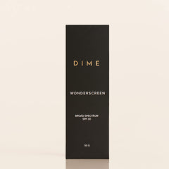 DIME Wonderscreen applied under makeup for seamless daily protection.