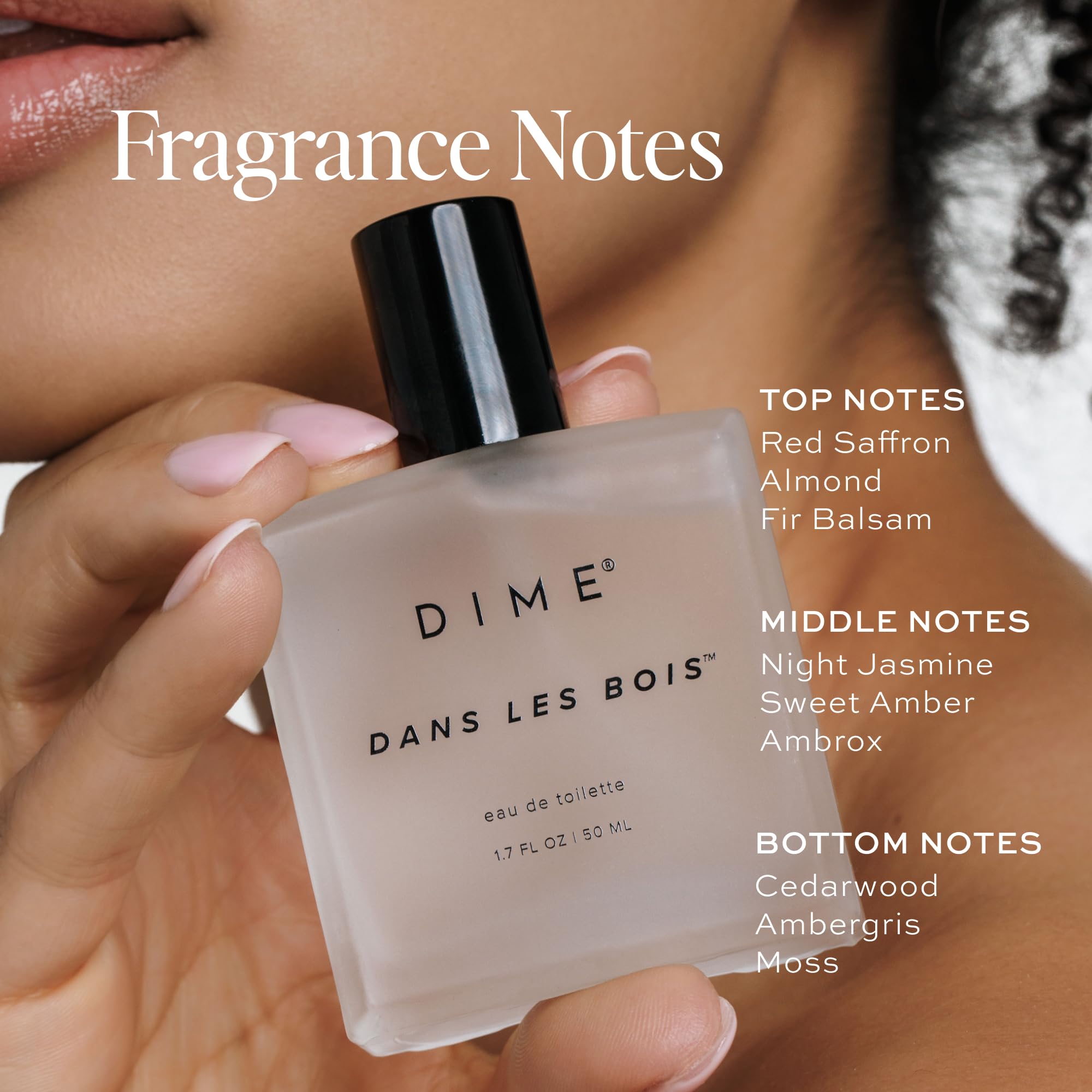 DIME Woodland base notes image featuring cedar, ambergris, and moss for a warm finish.
