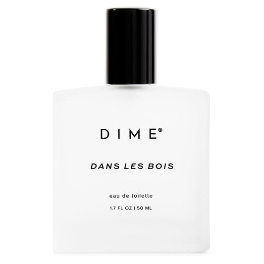DIME Woodland bottle front, premium packaging for everyday feminine fragrance.
