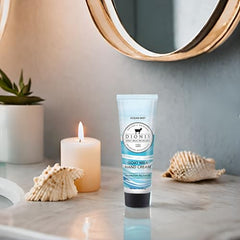 Dionis Goat Milk Hand Cream Ocean Mist bottle on bathroom counter