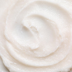 Ingredients on wooden board: goat milk, chamomile, sugar for skin care