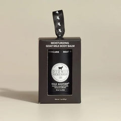 Texture closeup of Dionis Goat Milk Sole Soother Balm demonstrating non-greasy absorption