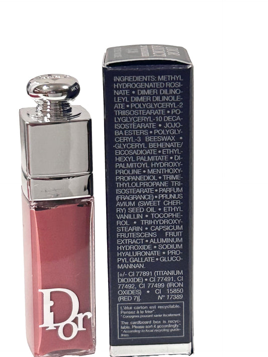 Close-up of Dior Addict Lip Maximizer Rose Nude mini swatch on lips