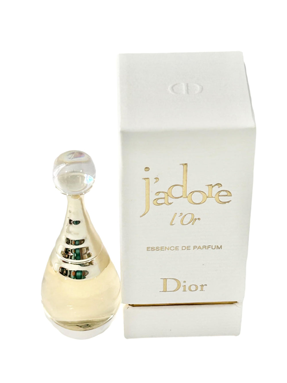 Dior J'adore Essence L'Or mini packaging front emphasizes compact travel size