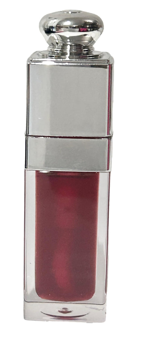 Dior Lip Glow Oil Color Reviver 062 Cherry Oil tube with natural tint and shine.