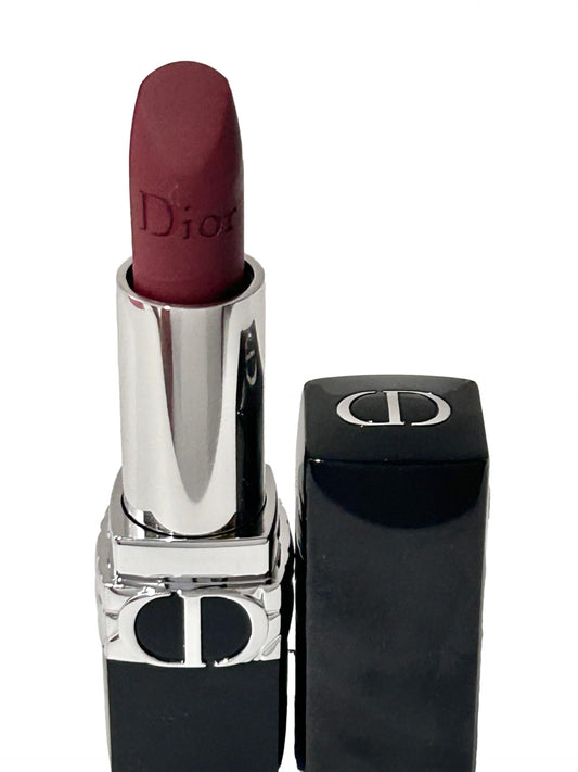 Dior Rouge Dior Lipstick 943 Euphoric Matte applying for bold daytime looks.
