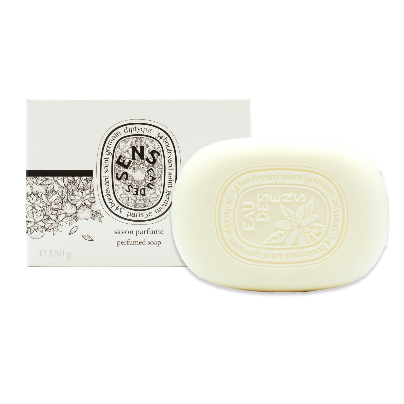 Diptyque Eau des Sens soap-bar close-up showing creamy lather for a pampering shower.