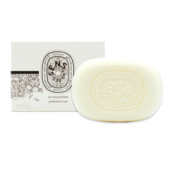 Diptyque Eau des Sens soap-bar close-up showing creamy lather for a pampering shower.