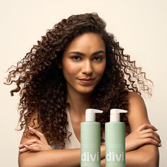 Divi brand logo on label indicating vegan cruelty-free hair care.