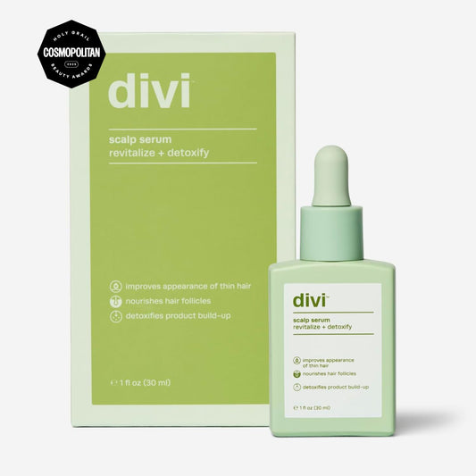 Divi Scalp Serum in hand ready for targeted scalp treatment.