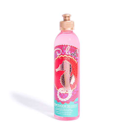 D'Luchi tanning oil bottle with coconut oil for a smooth, natural tan.