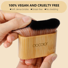 Docolor all-in-one body makeup brush for foundation, self-tanner, and bronzer.