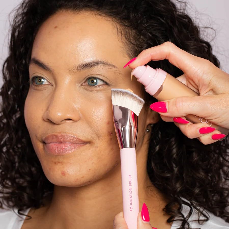 DOLL 10 NO T.C.E. application brush pairing for seamless buildable coverage.